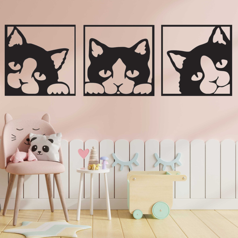 The picture on the wall of a cat made of colored wooden plywood