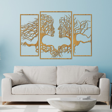 Drevený obraz na stenu tváre a stromy znázorňujú spojenie medzi človekom a prírodou