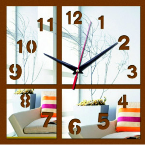 Desing adhesive clock on the wall mirror.